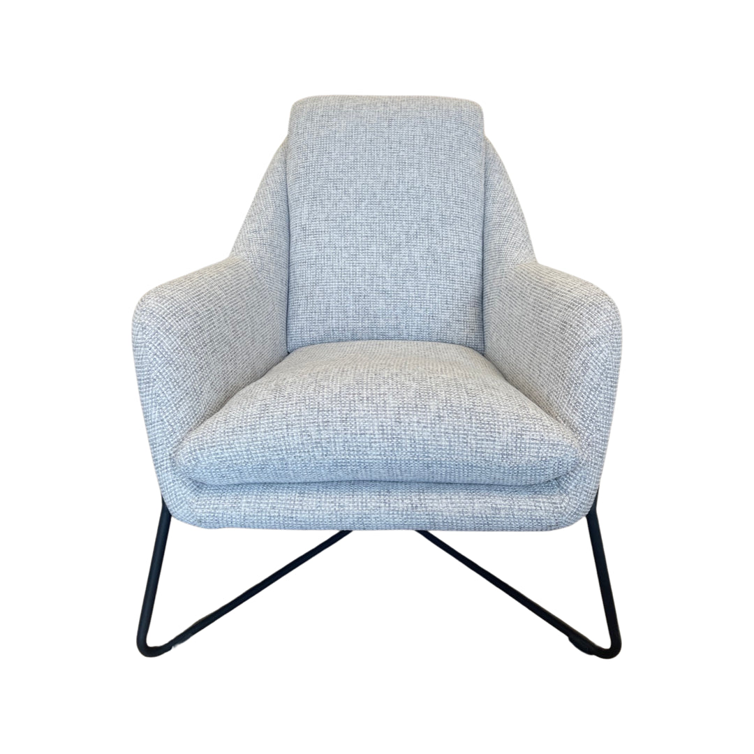Combined mid-century modern styling and grey tweed upholstery push this Monroe club chair to the top of current furnishing trends.