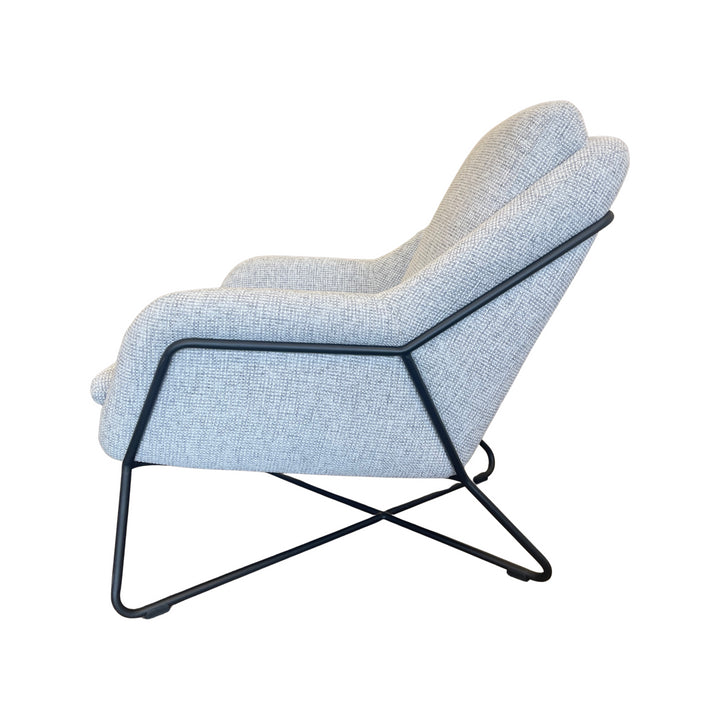 Combined mid-century modern styling and grey tweed upholstery push this Monroe club chair to the top of current furnishing trends.