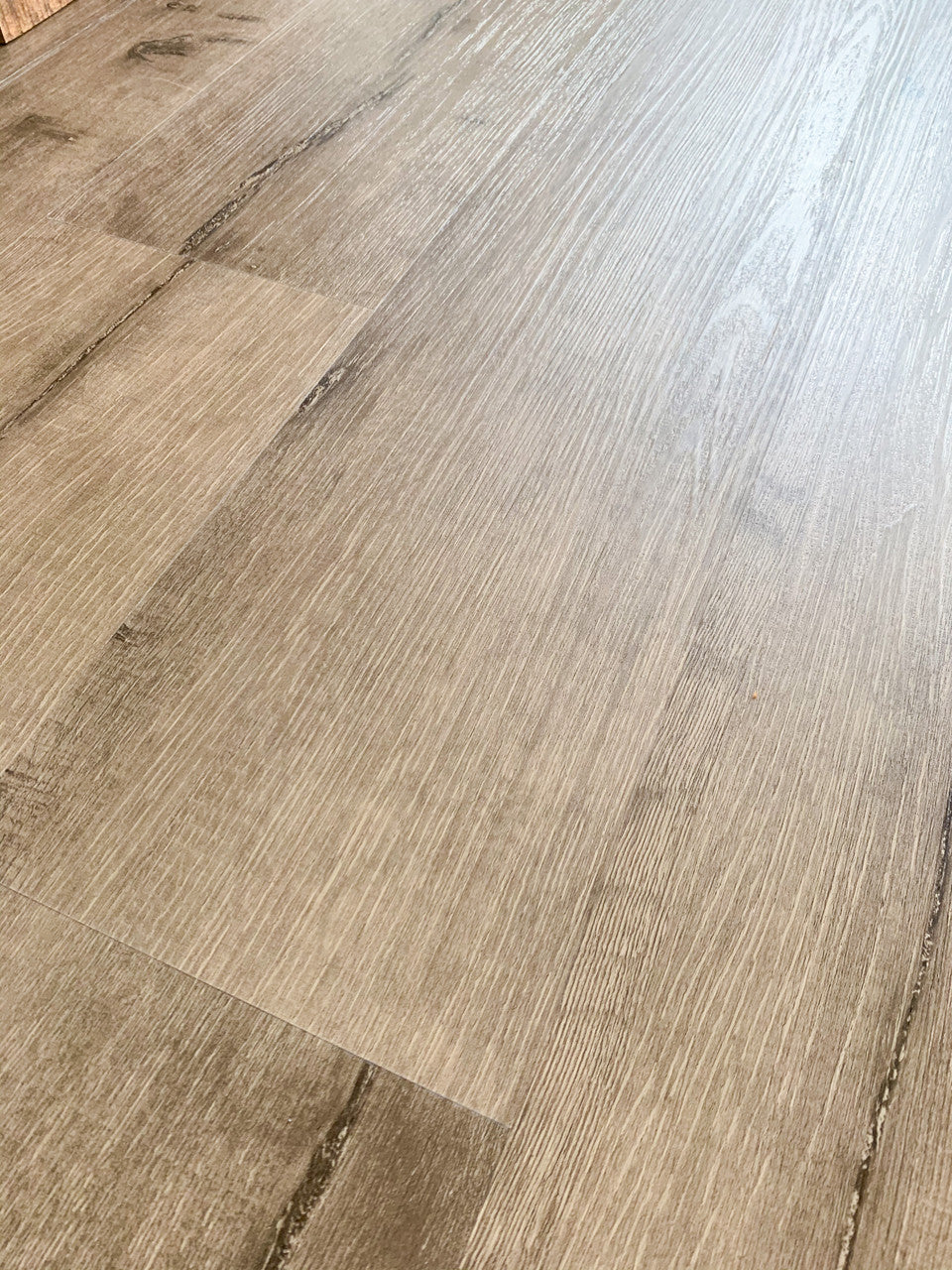 mid-tone brown chestnut like Vinyl Plank Flooring