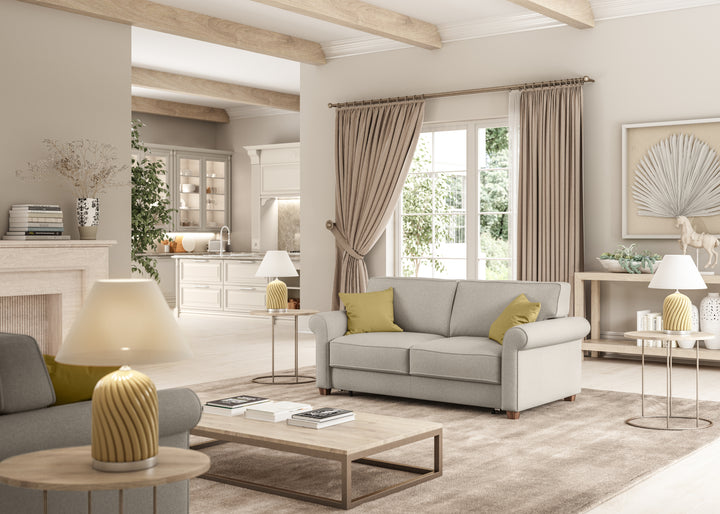 Luonto rolled arm love seat sleeper in luxury room