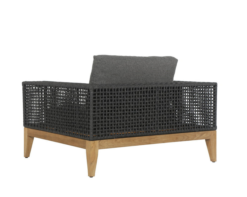 Features a deep seat in gracebay grey fabric with wide powder coated aluminum armrests wrapped in dark greymix weave. A solid natural teak wood frame completes the design.