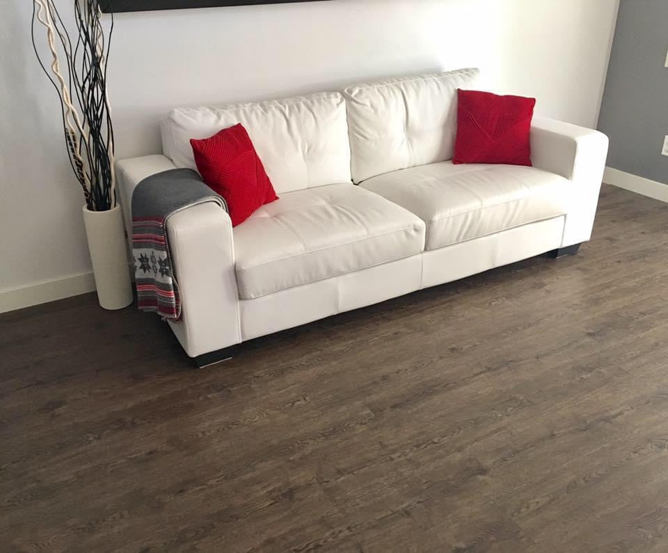 mid to dark brown oak patterned vinyl plank flooring