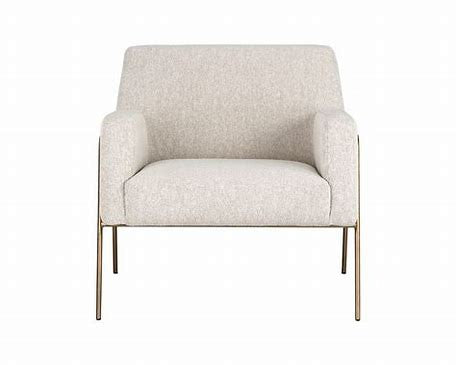 The Cybil chair with gold accent frame
