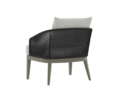 This comfortable design features a barrelback frame wrapped in dark greymix weave and seat cushions in copacabana marble fabric.