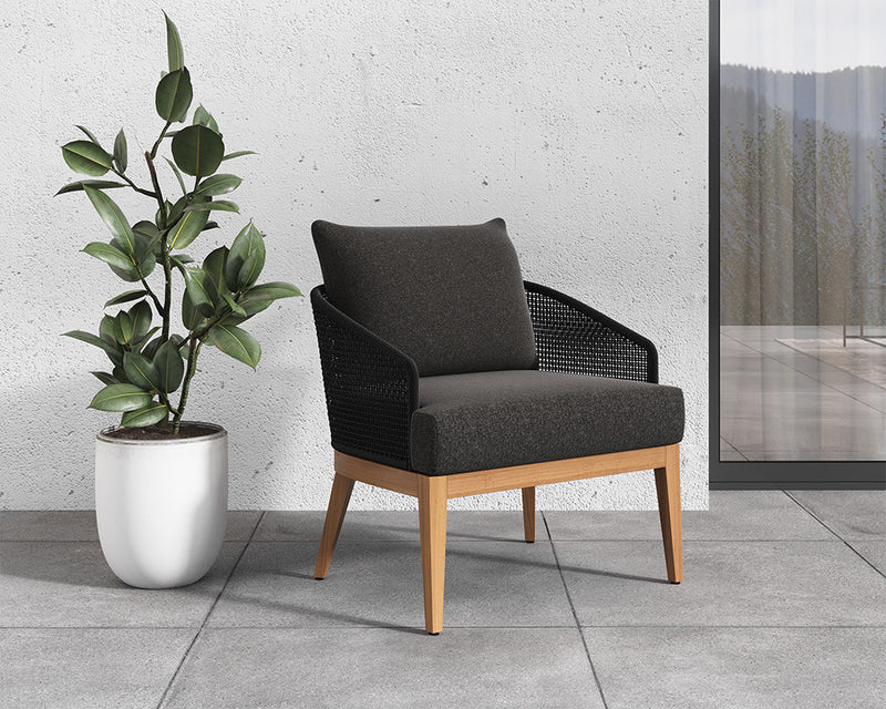 This comfortable design features a barrelback frame wrapped in dark greymix weave and seat cushions in gracebay grey fabric. A natural teak wood base completes the look