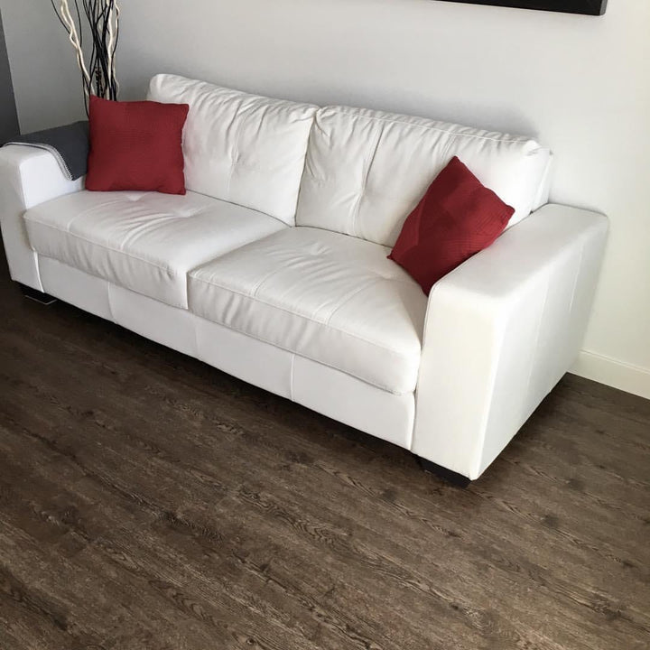 mid to dark brown oak patterned vinyl plank flooring